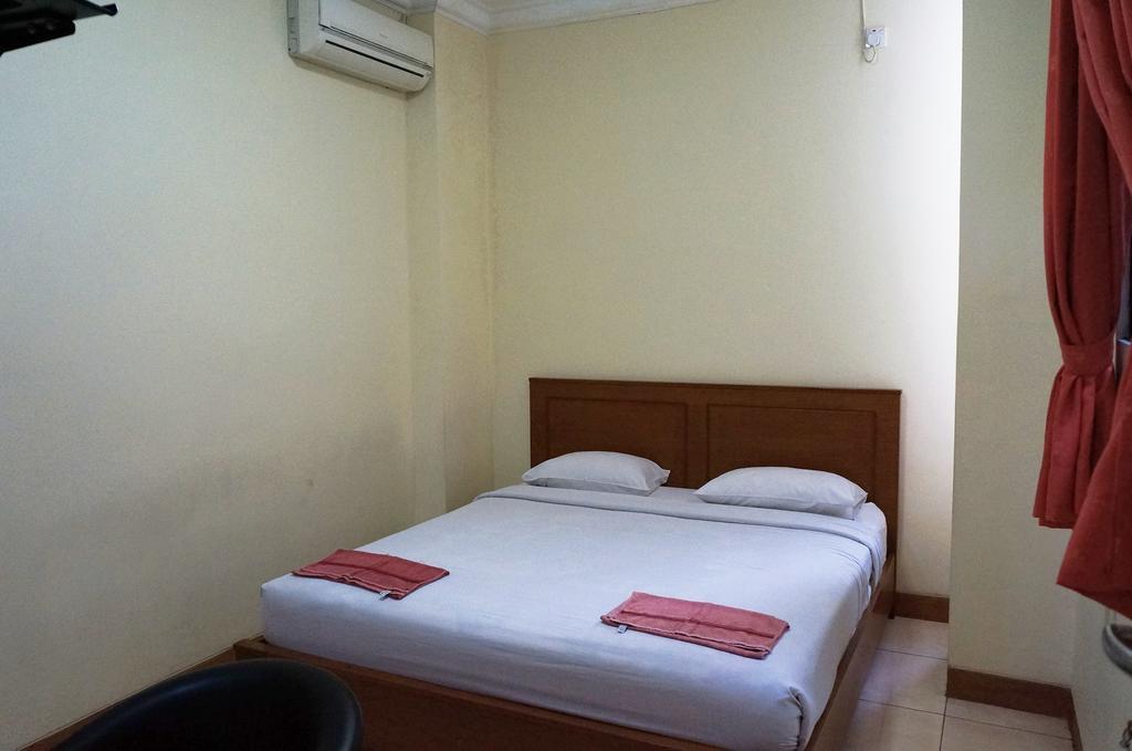 Jesnic Hotel Padang  Habitación foto